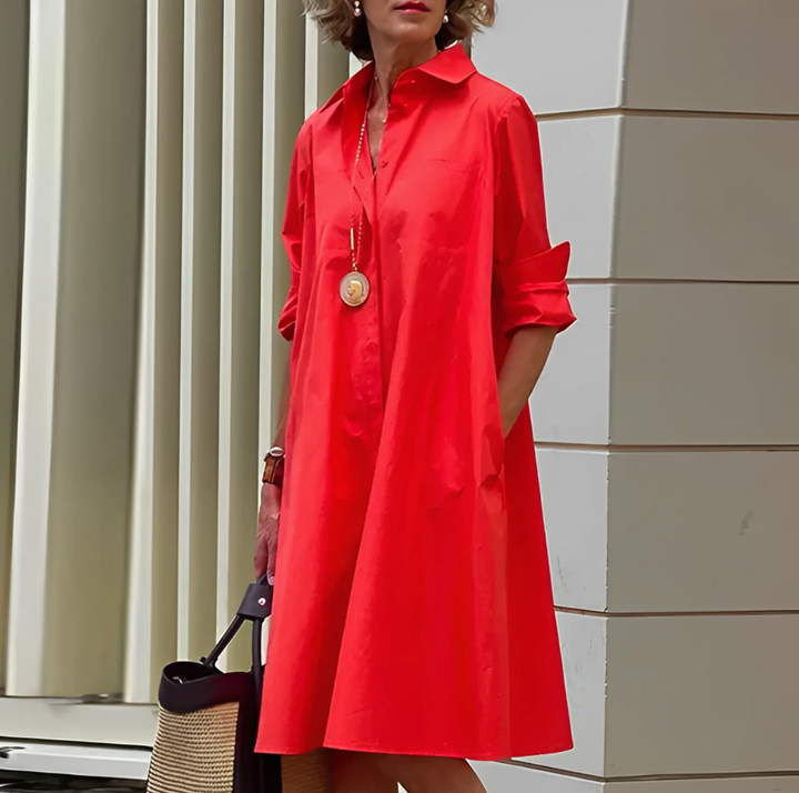 Elegant women's black flowy button midi shirt dress, perfect for versatile day to night styling.