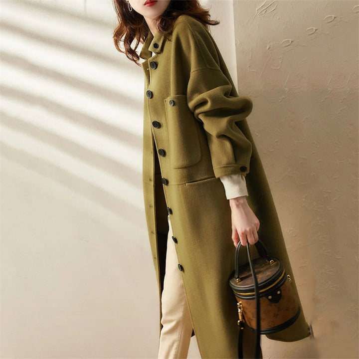 Stylish women's green long coat, perfect outerwear for versatile casual and formal winter fashion.
