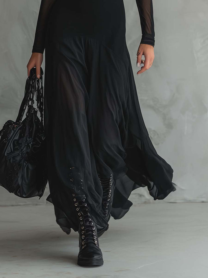 Fashionable women's black long sleeve maxi dress with ruffle skirt. An elegant evening gown for formal & special events.