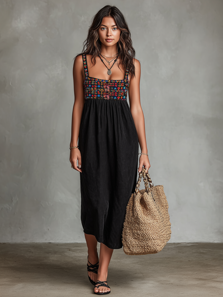 Stylish women's black midi dress, sleeveless, square neck, and delicate floral embroidery. Great for summer fashion & parties.