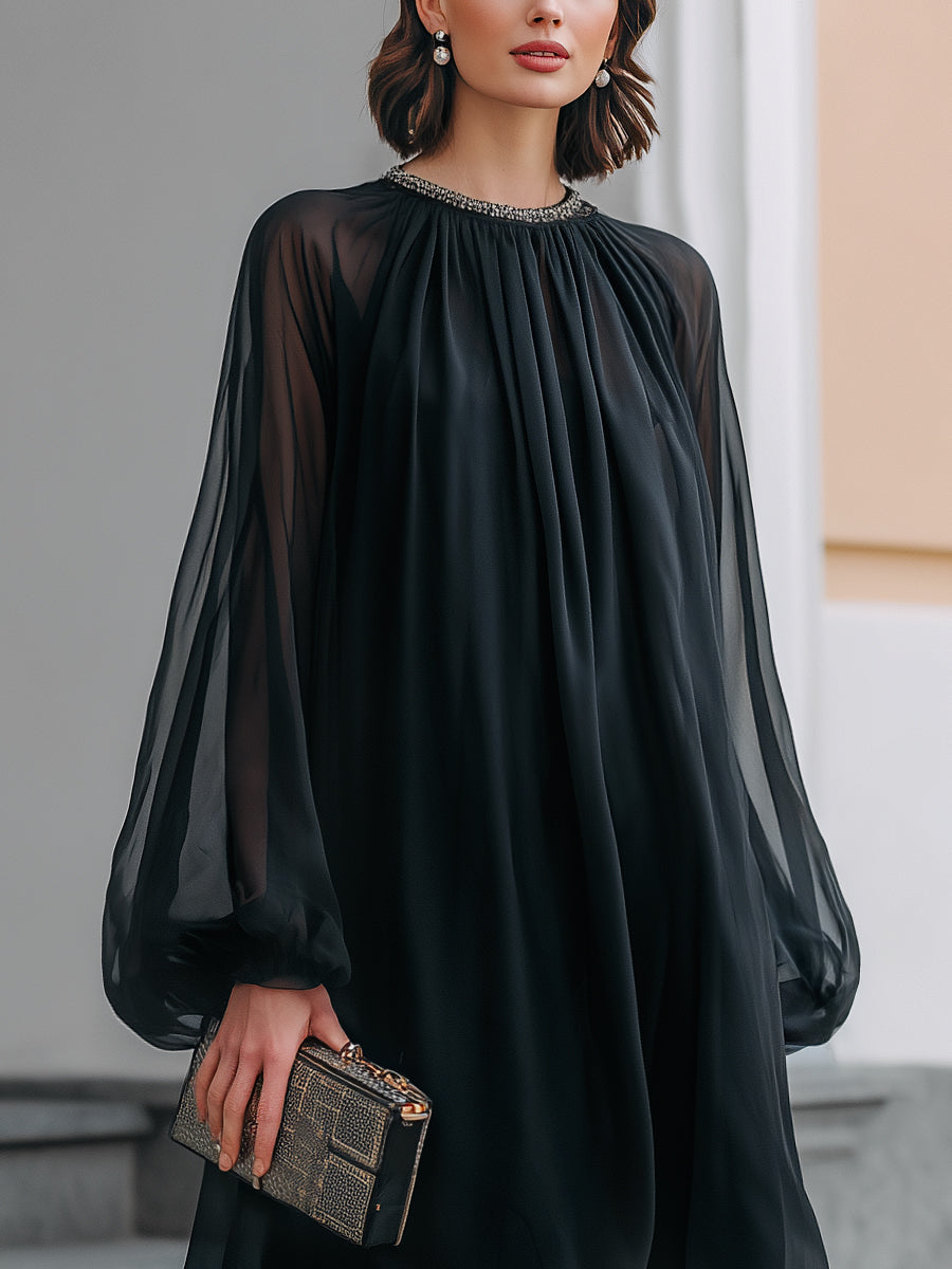 Women's elegant black mini dress featuring a detailed embellished neck & chic flowing balloon sleeves for party wear.