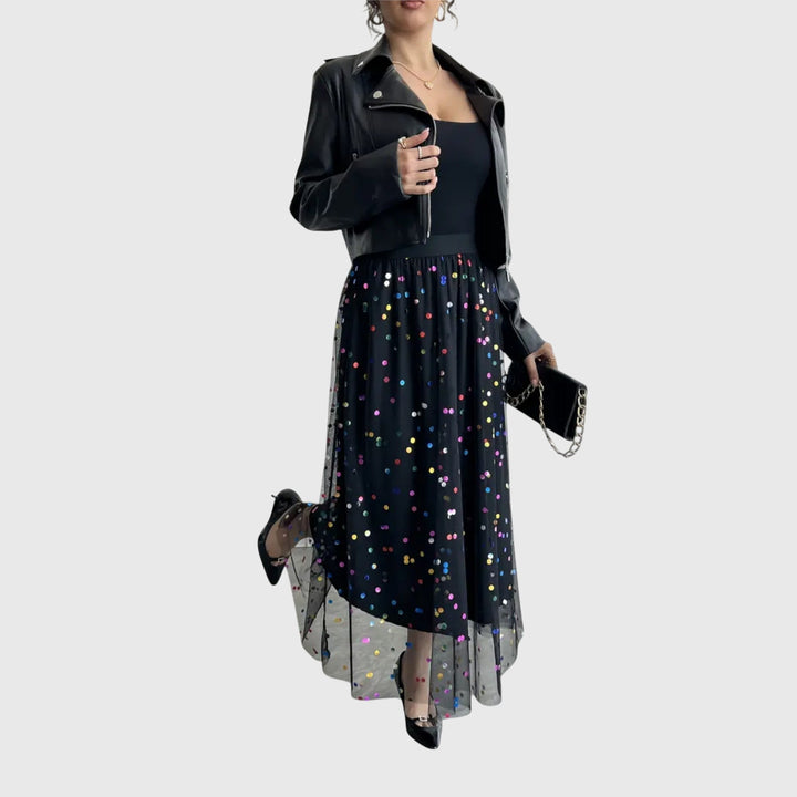 Chic women's black sequin midi skirt with an asymmetric hem, a dazzling piece for evening and party wear.