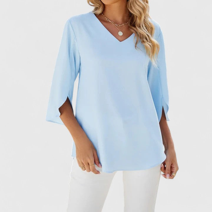 Stylish women's workwear blouse, ideal for business casual and sophisticated office looks.