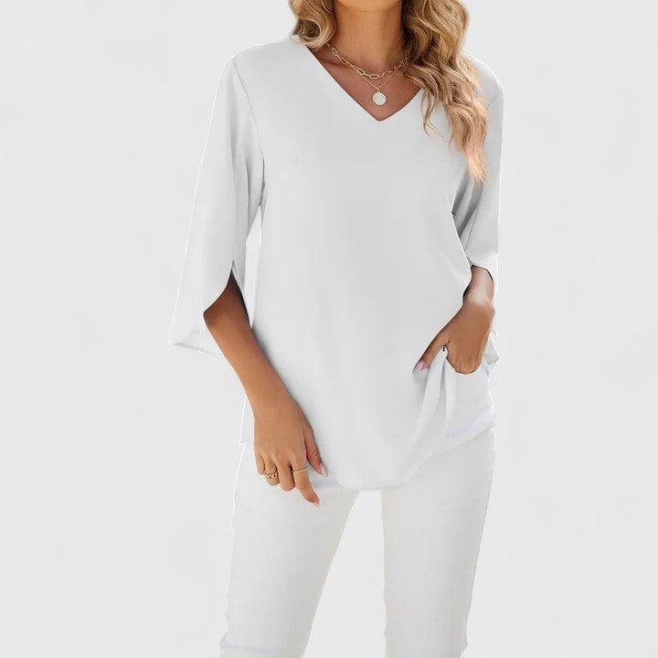Comfortable & elegant women's blouse, offering versatile style for work & casual wear.