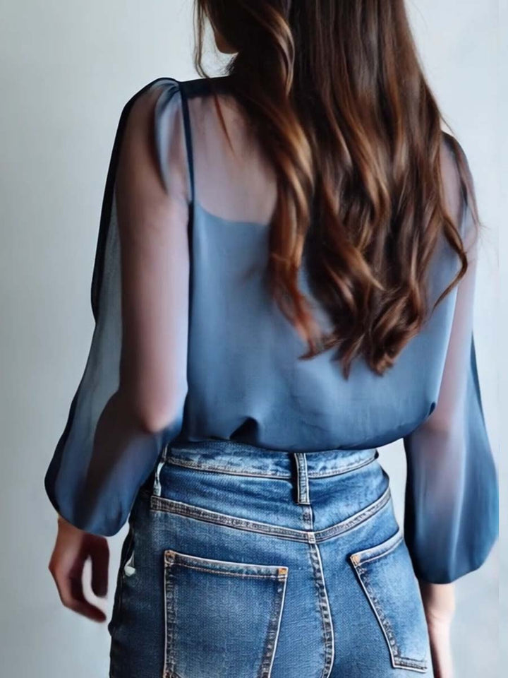 Chic casual women's blouse with elegant floral embroidery, sheer long sleeves & V-neck. Versatile for any occasion.