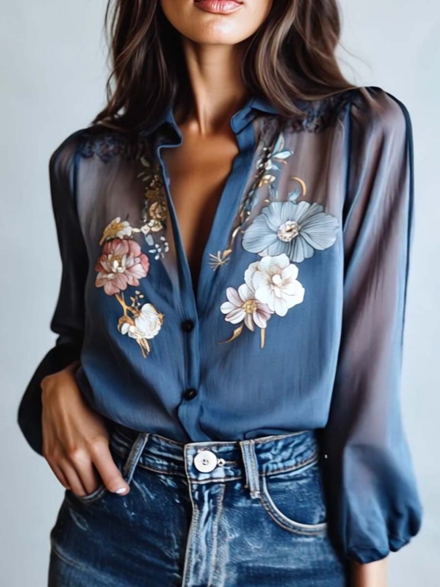 Elegant women's top for any occasion, featuring beautiful floral embroidery, sheer long sleeves, & a stylish V-neck.