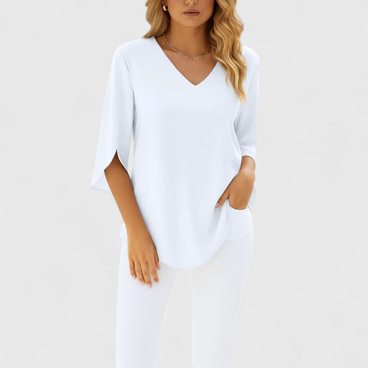 Versatile women's split sleeve blouse; comfortable and stylish for casual or professional fashion.