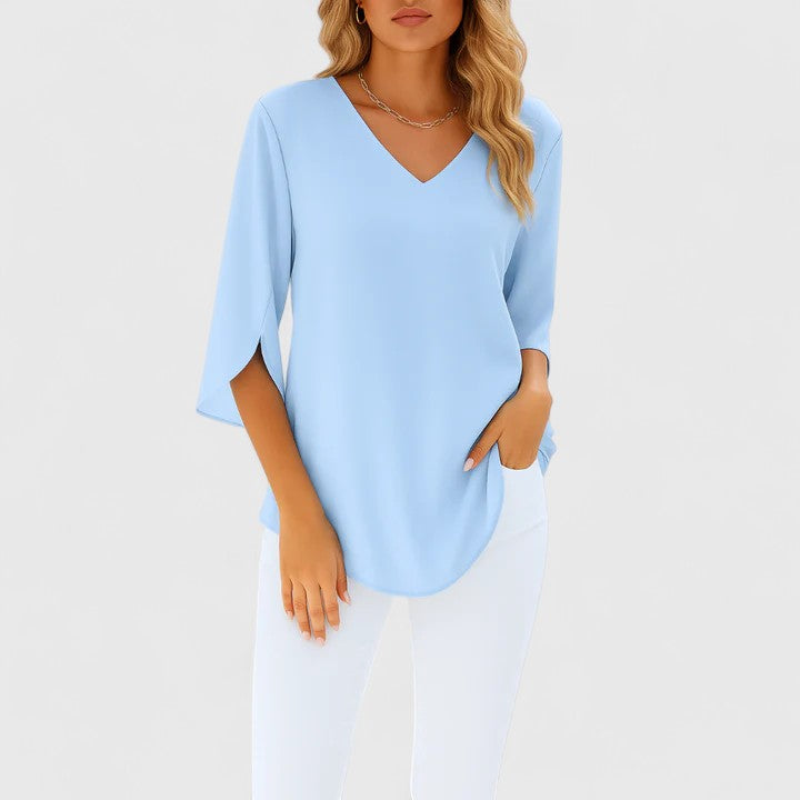 Chic women's top: an elegant split sleeve blouse, ideal for fashionable everyday or office wear.