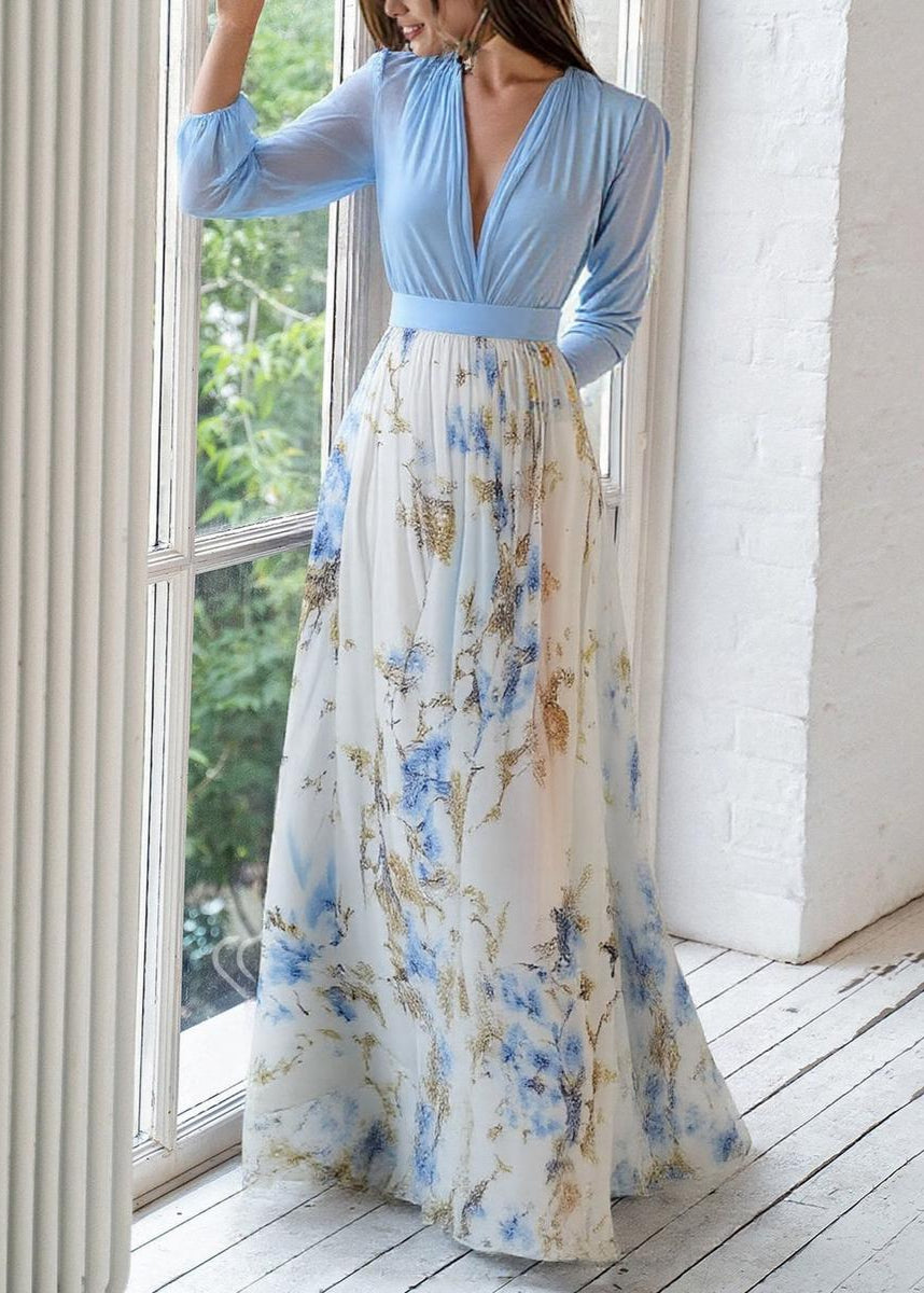 Comfortable & elegant women's long-sleeve maxi dress with a deep V-neck and vibrant blue floral print.