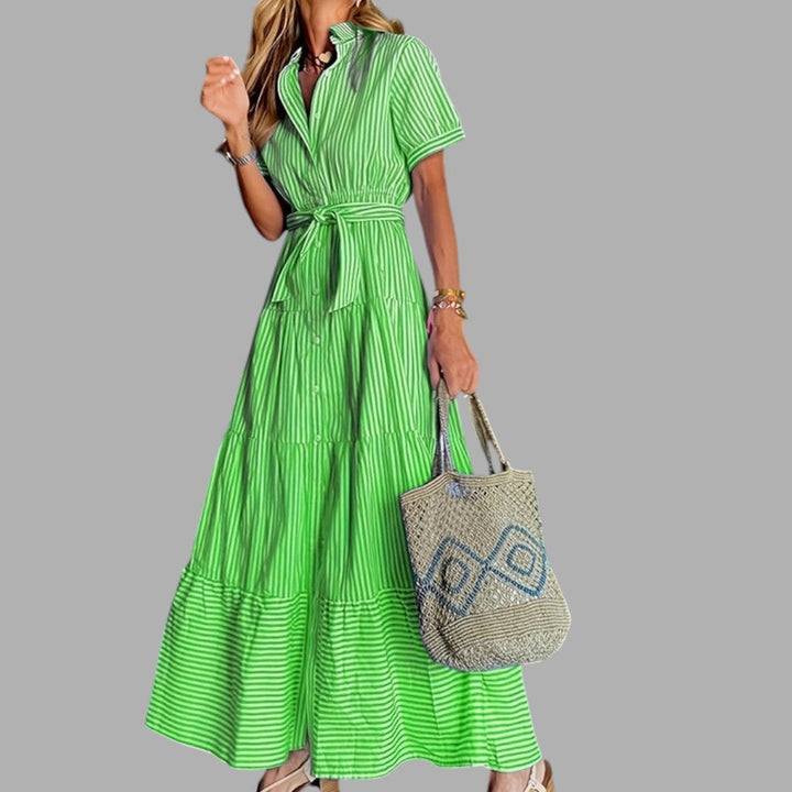 Elegant women's blue maxi dress, perfect for formal events & special occasions. Flowing, feminine evening gown.