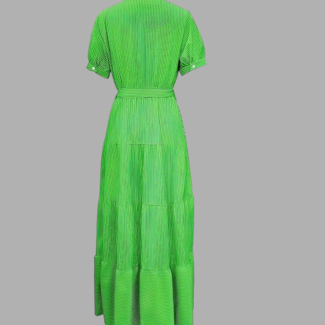 Feminine green maxi dress for women. Elegant formal wear with a flowing silhouette, comfortable for any special occasion.