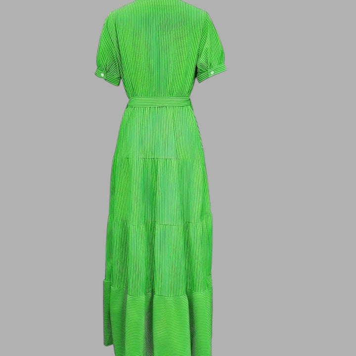 Feminine green maxi dress for women. Elegant formal wear with a flowing silhouette, comfortable for any special occasion.