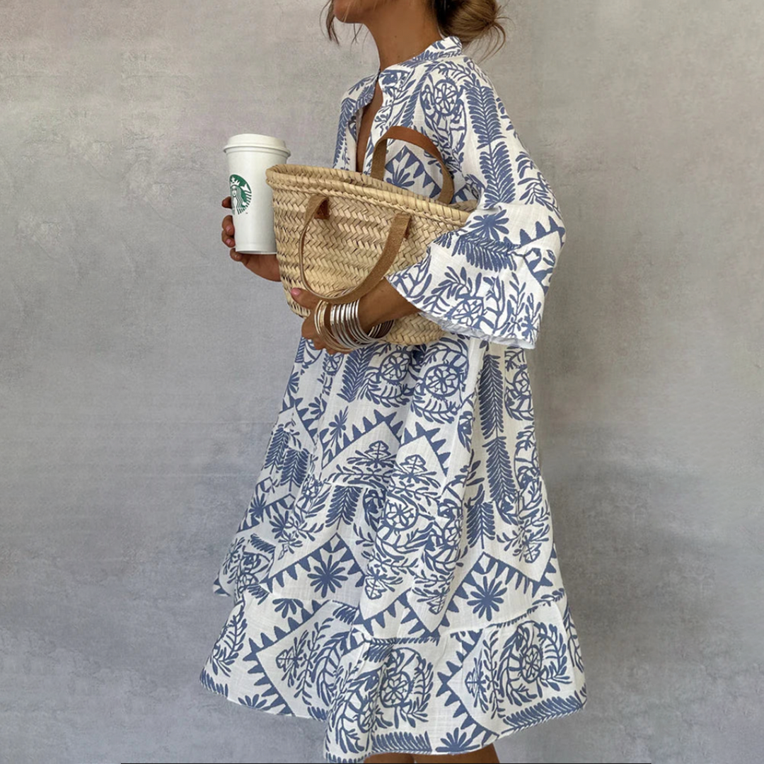 Elegant women's boho floral maxi dress, tiered design with long sleeves, perfect for spring & summer fashion.