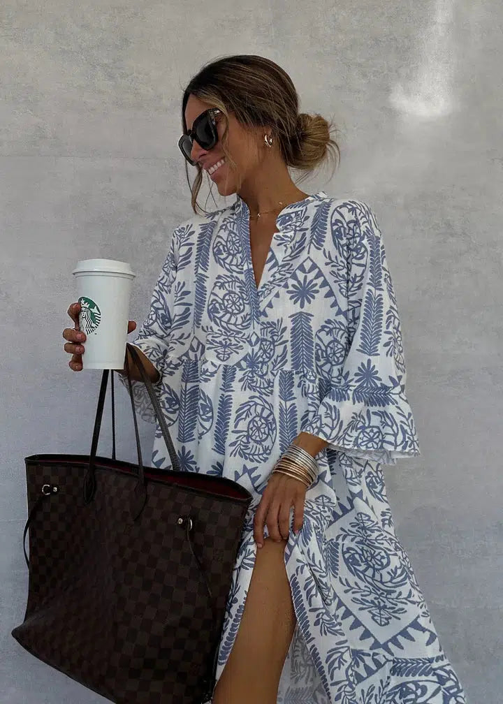 Stylish women's tiered boho floral maxi dress, features an elegant design with long sleeves for summer.