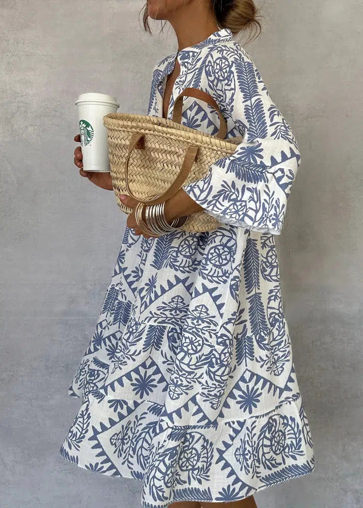 Boho floral long sleeve maxi dress for women, an elegant tiered design, perfect for effortless summer style.