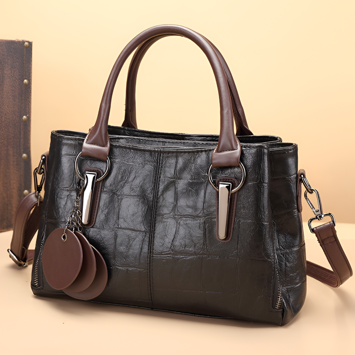 Versatile women's Boston bag featuring trendy croc embossing, a must-have fashion accessory for any outfit.