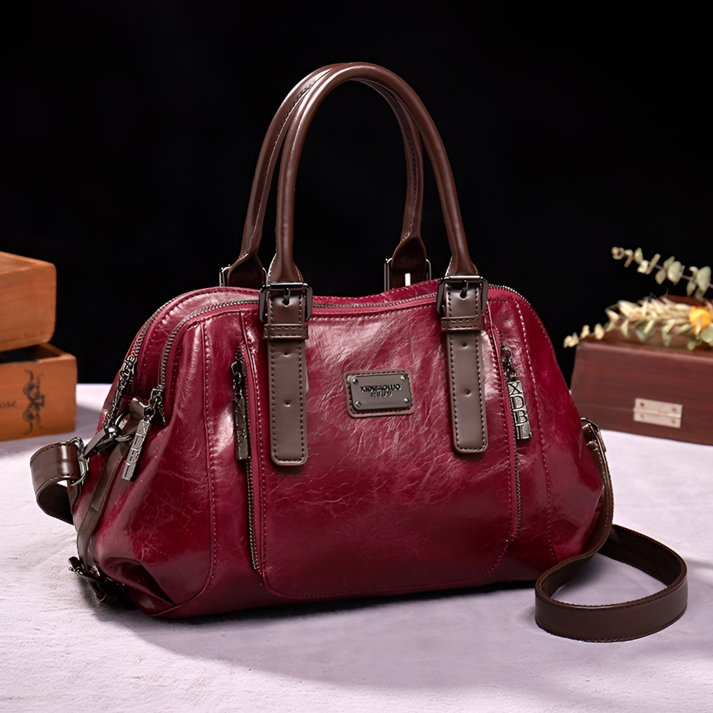 Chic women's Boston handbag showcasing exquisite croc embossing, an elegant and practical shoulder bag.
