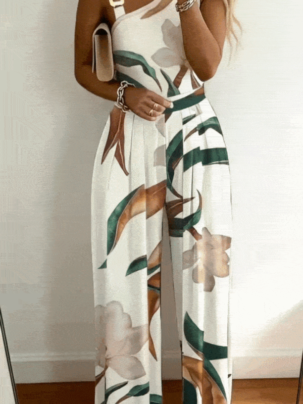 Stylish women's wide leg jumpsuit featuring an elegant botanical floral print. Ideal for comfortable, fashionable occasion wear.