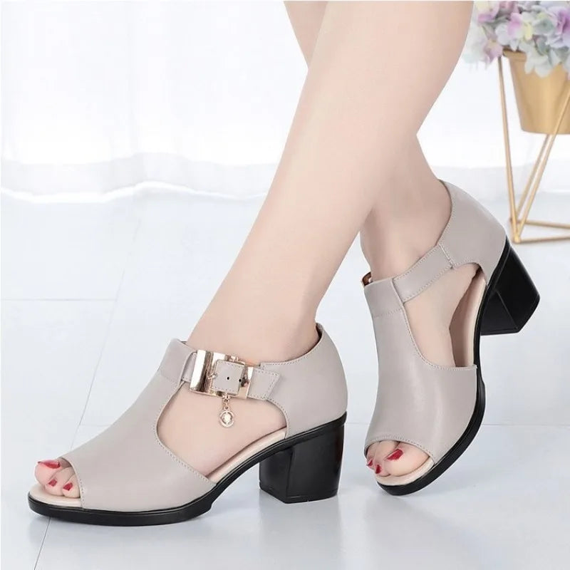 Side profile of versatile women's block heels with a decorative buckle, suitable for any occasion.