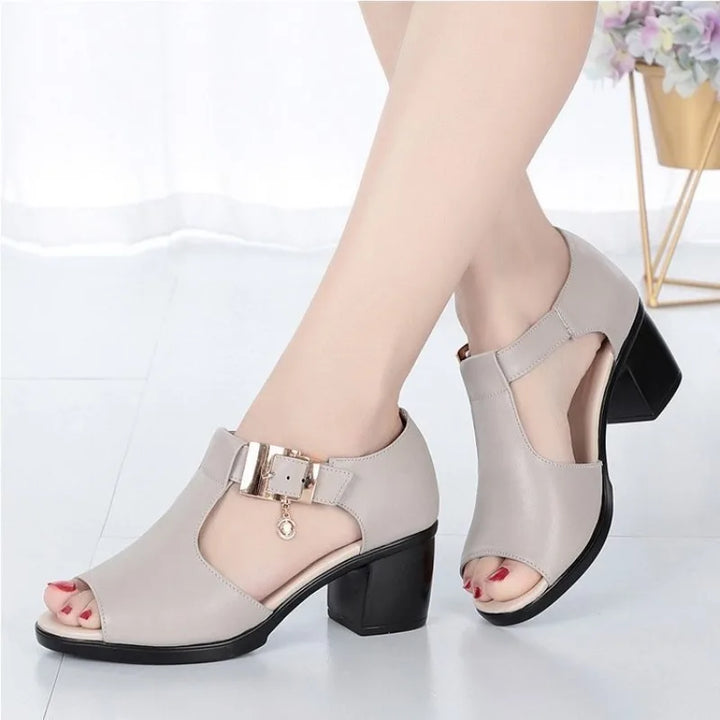 Side profile of versatile women's block heels with a decorative buckle, suitable for any occasion.