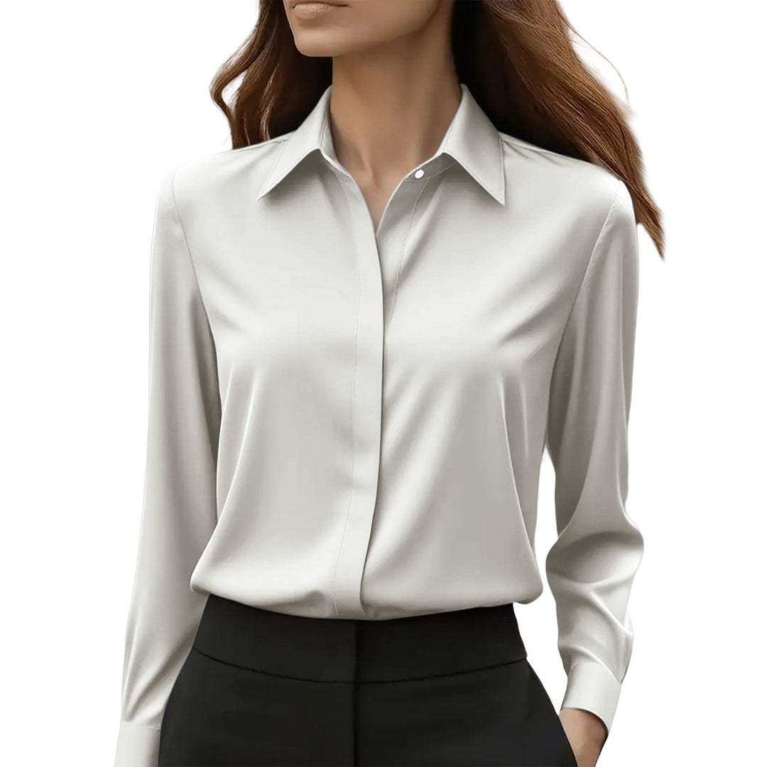 Women's elegant long sleeve button-front blouse. Chic top for office wear, professional settings & versatile style.