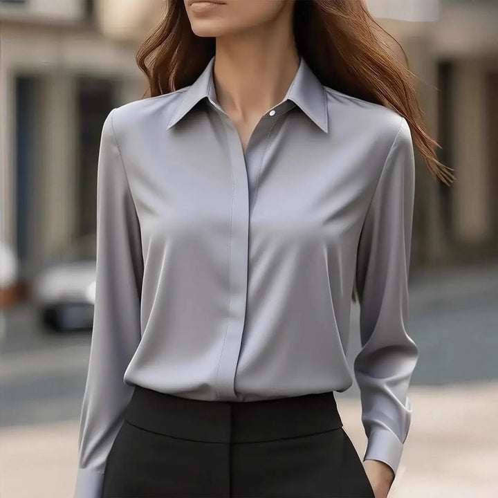 Polished women's button-front blouse. Chic long sleeve top for elegant office wear, work & versatile fashion.