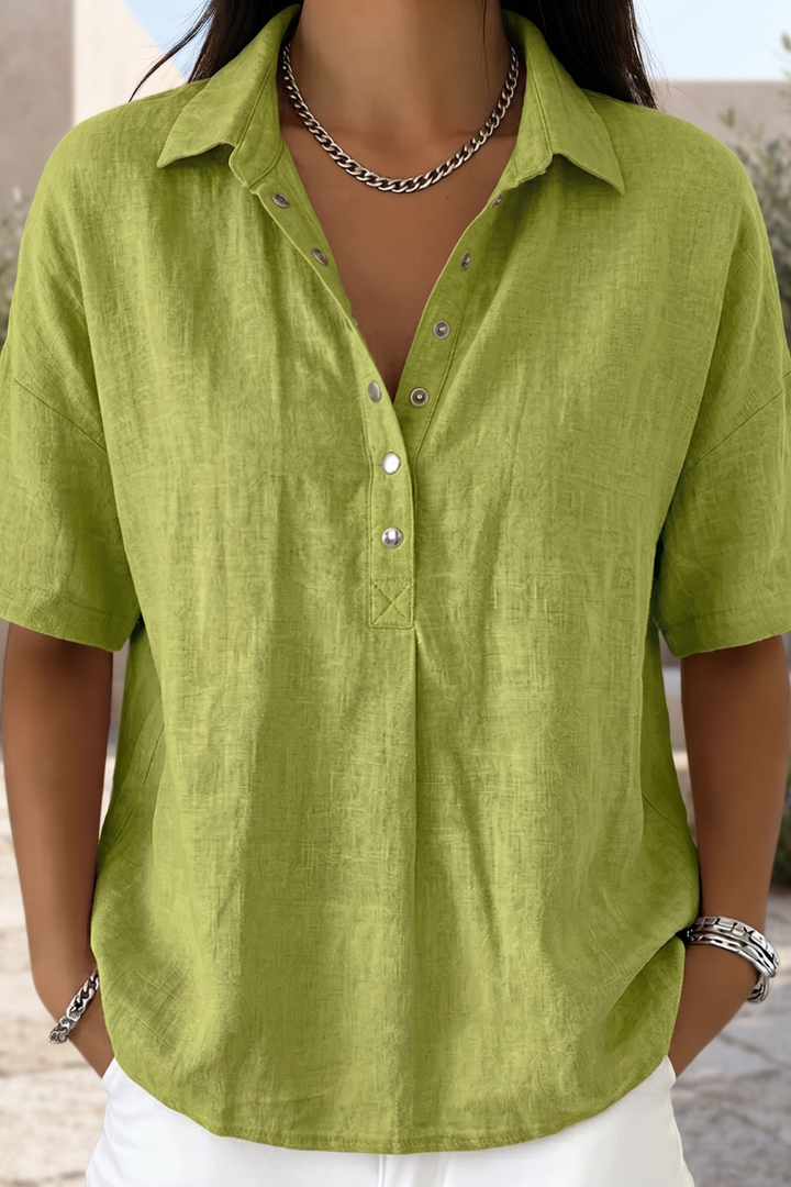 Stylish women's button blouse with long sleeves. Elegant top for everyday fashion, work, or casual outfits.
