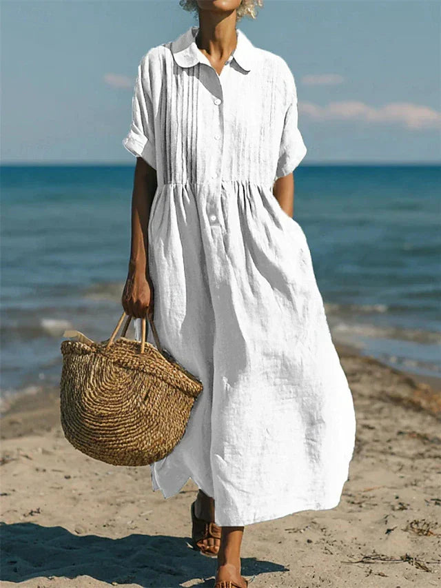 Elegant women's button-front maxi dress, perfect for sophisticated spring and summer day wear.