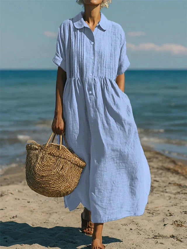 Chic collared shirt dress for women, featuring a full button-front and flowy long design.