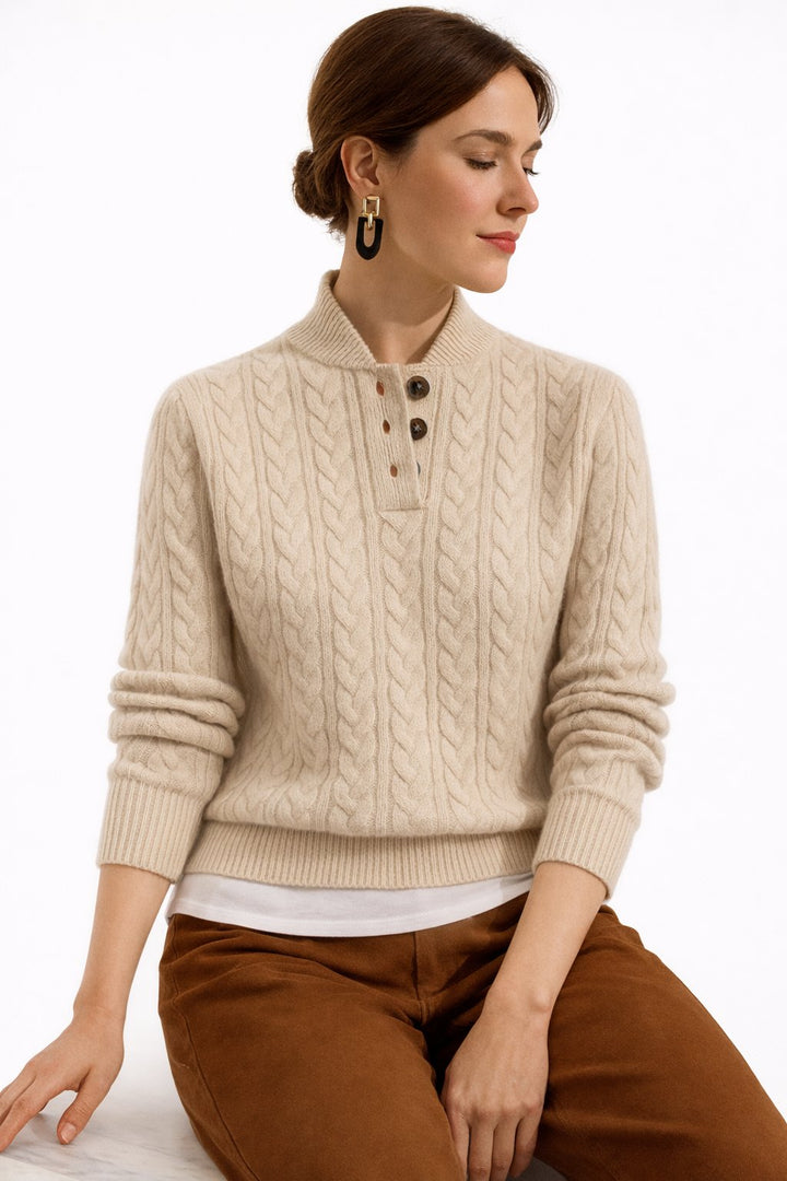 Classic elegant women's cable knit pullover sweater. Comfortable long sleeve, button-neck top for versatile fall fashion.