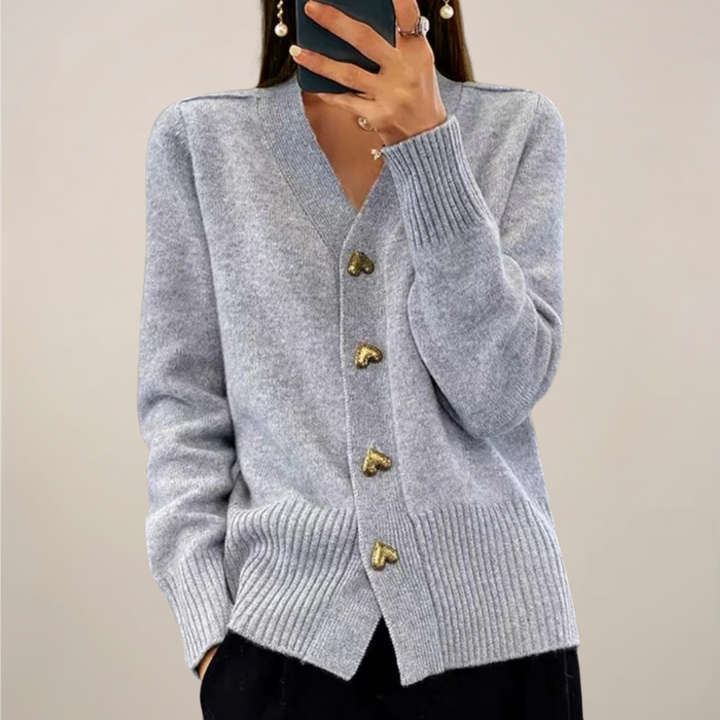 Versatile women's long sleeve cardigan with elegant gold heart buttons, cozy and chic.