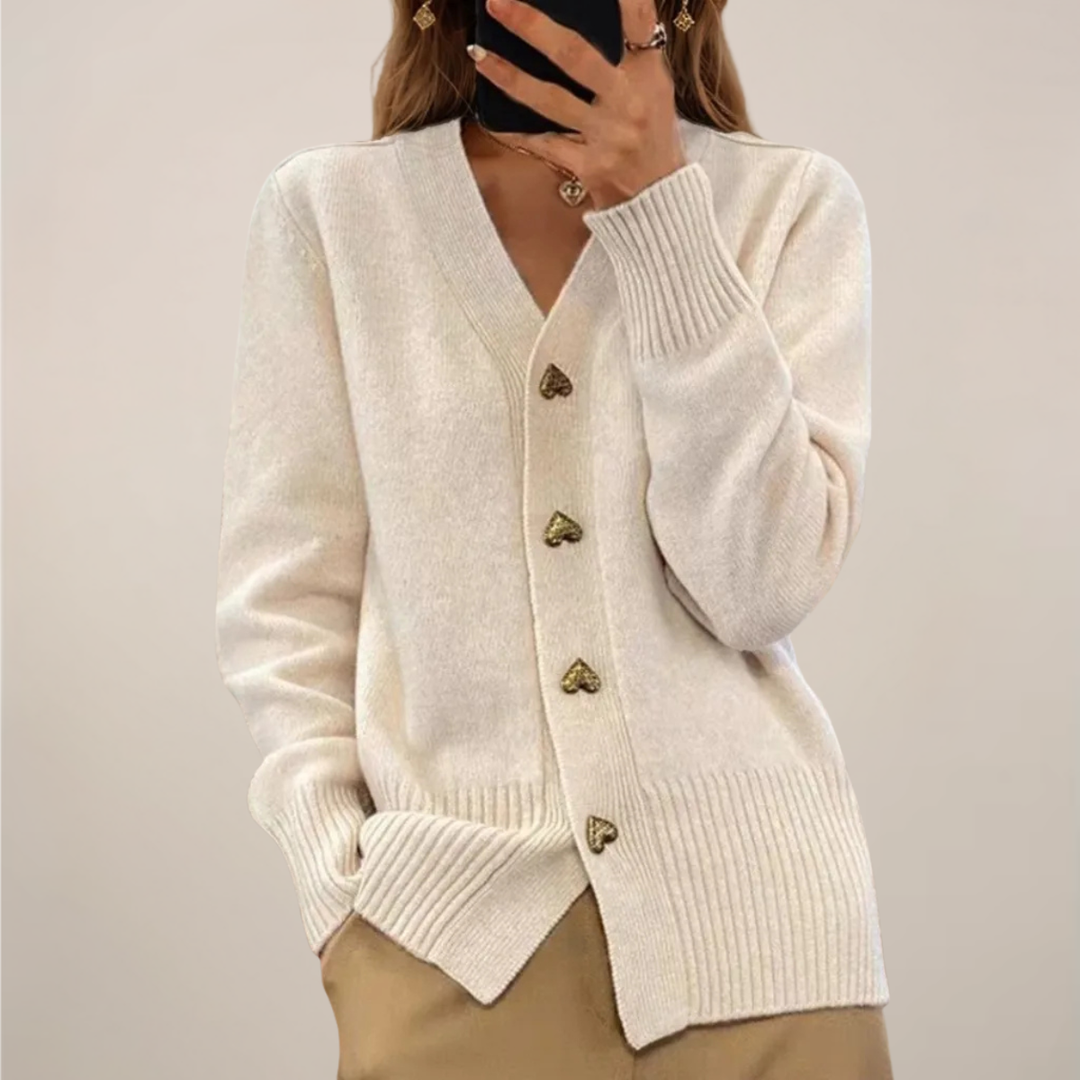 Cozy and stylish women's long sleeve cardigan, featuring elegant gold heart buttons for fashion.