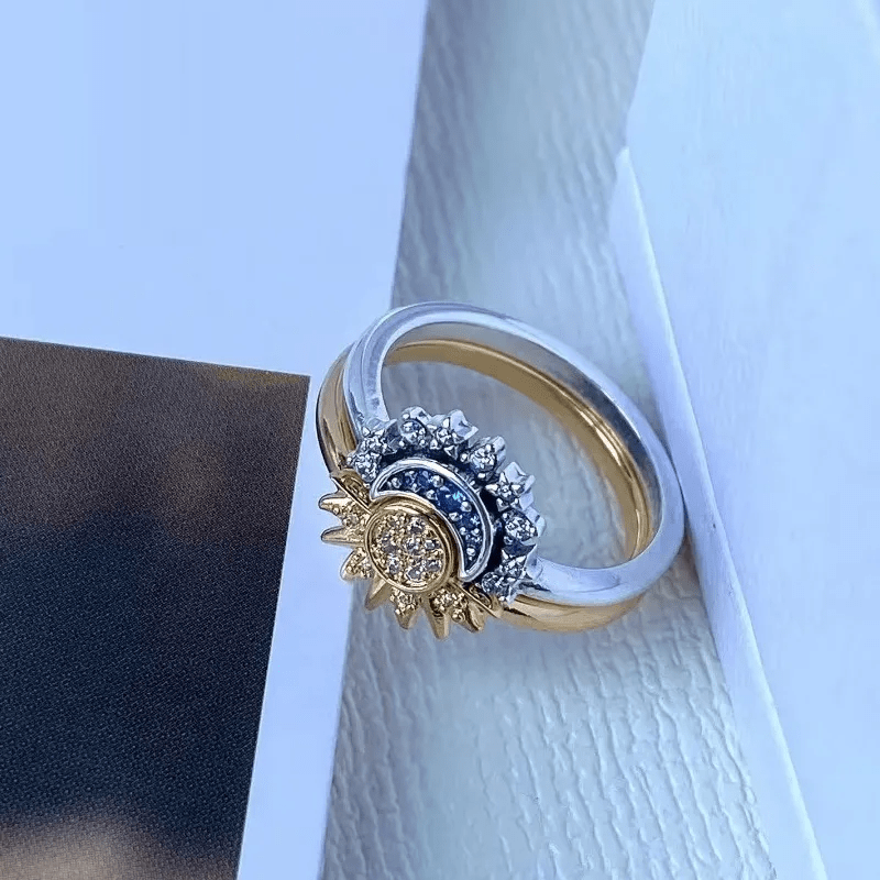 Unique celestial sun & moon ring for women, a sparkling cosmic jewelry piece with crystal accents. Elegant and stylish.
