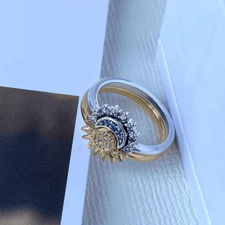 Unique celestial sun & moon ring for women, a sparkling cosmic jewelry piece with crystal accents. Elegant and stylish.