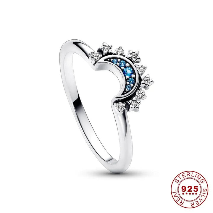 Detailed women's celestial sun & moon ring, featuring elegant design and sparkling crystal accents. Unique fashion ring.