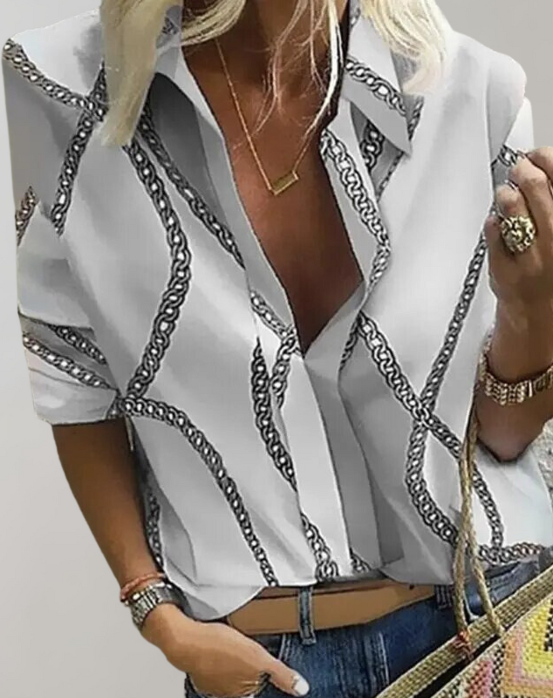 Stylish patterned long sleeve blouse for women. Tailored fit and sophisticated chain print for fashion-forward looks.