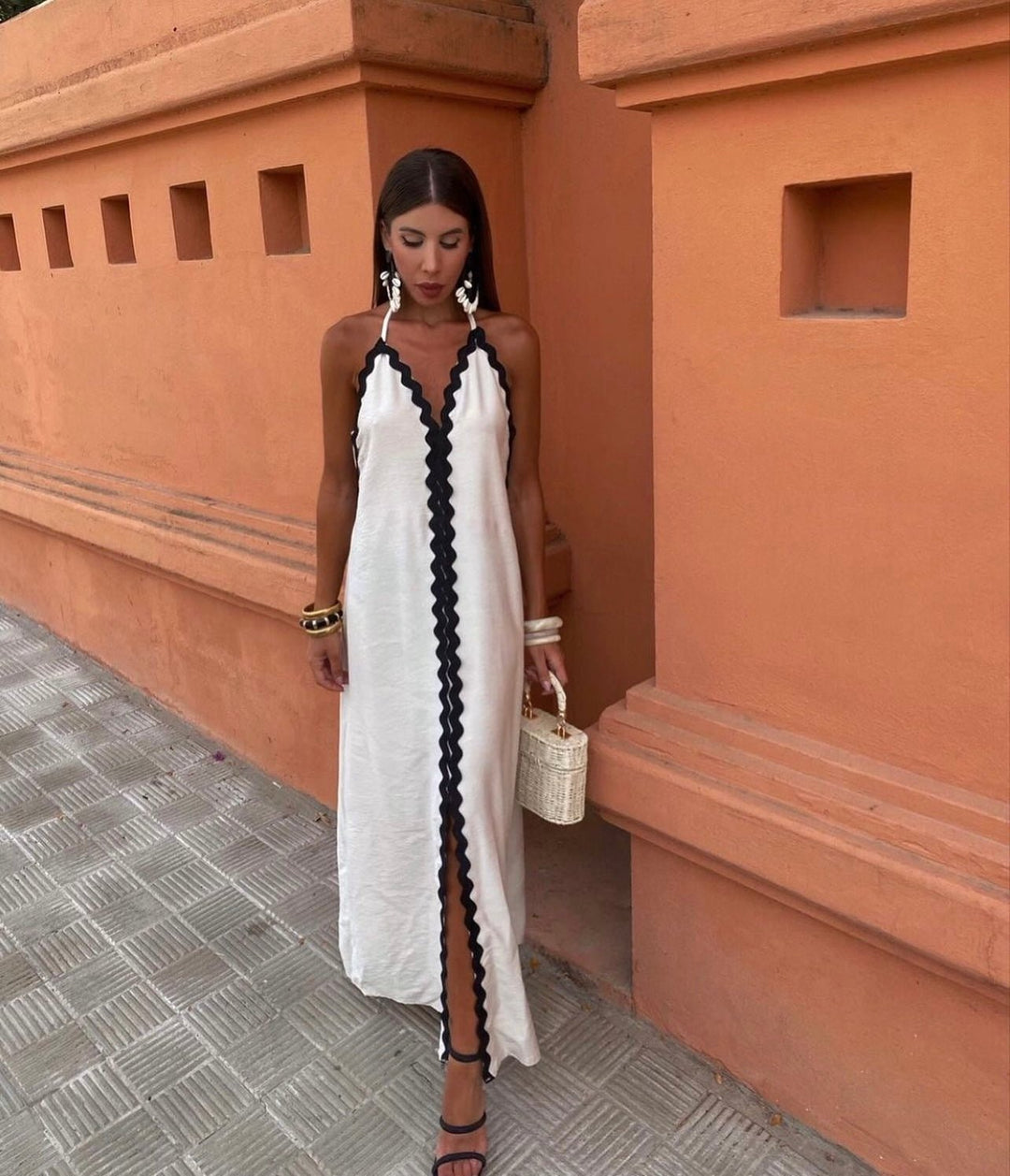 Chic sleeveless maxi dress for women, featuring contrast trim, ideal elegant wedding guest or party wear.
