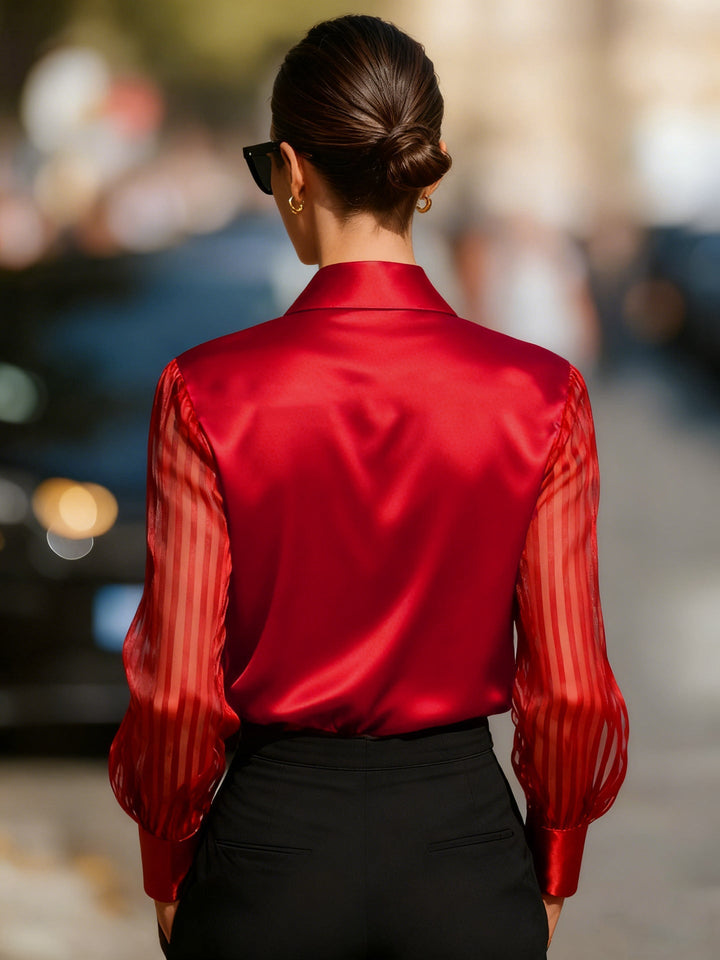 Classic women's collared blouse with elegant sheer stripe long sleeves. A sophisticated button-up dressy top.