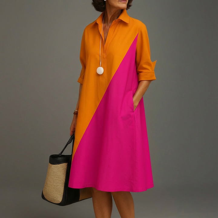Elegant women's color-block midi dress with a sophisticated design, perfect for versatile event wear.