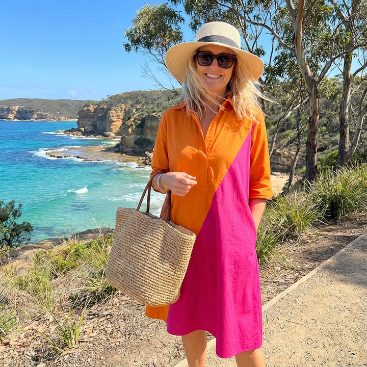 Sophisticated A-line button-down midi dress for women featuring a chic color-block pattern.