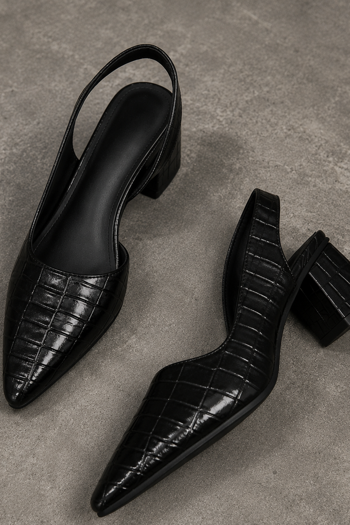Chic black comfort heels for women. Ideal elegant footwear for office, formal events, and everyday use.