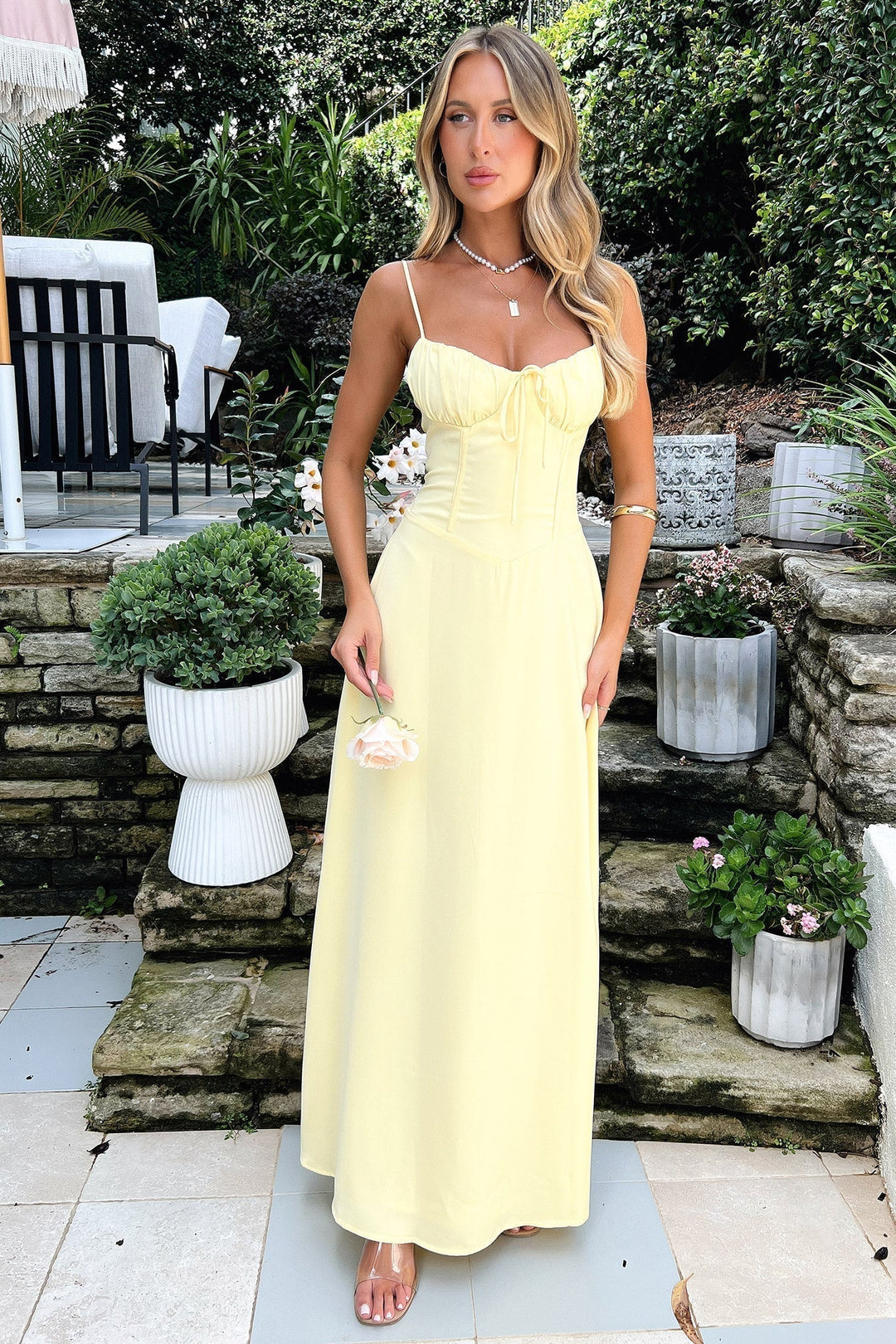 Sophisticated women's elegant corset maxi dress. Sweetheart neckline, perfect for formal wedding guests.