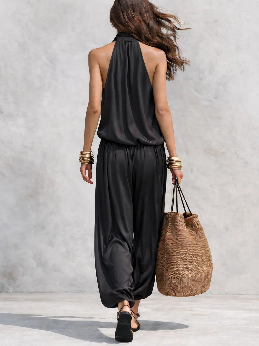 Flowy bohemian cowl neck halter top & wide leg pant set for women, ideal for summer vacation outfits.