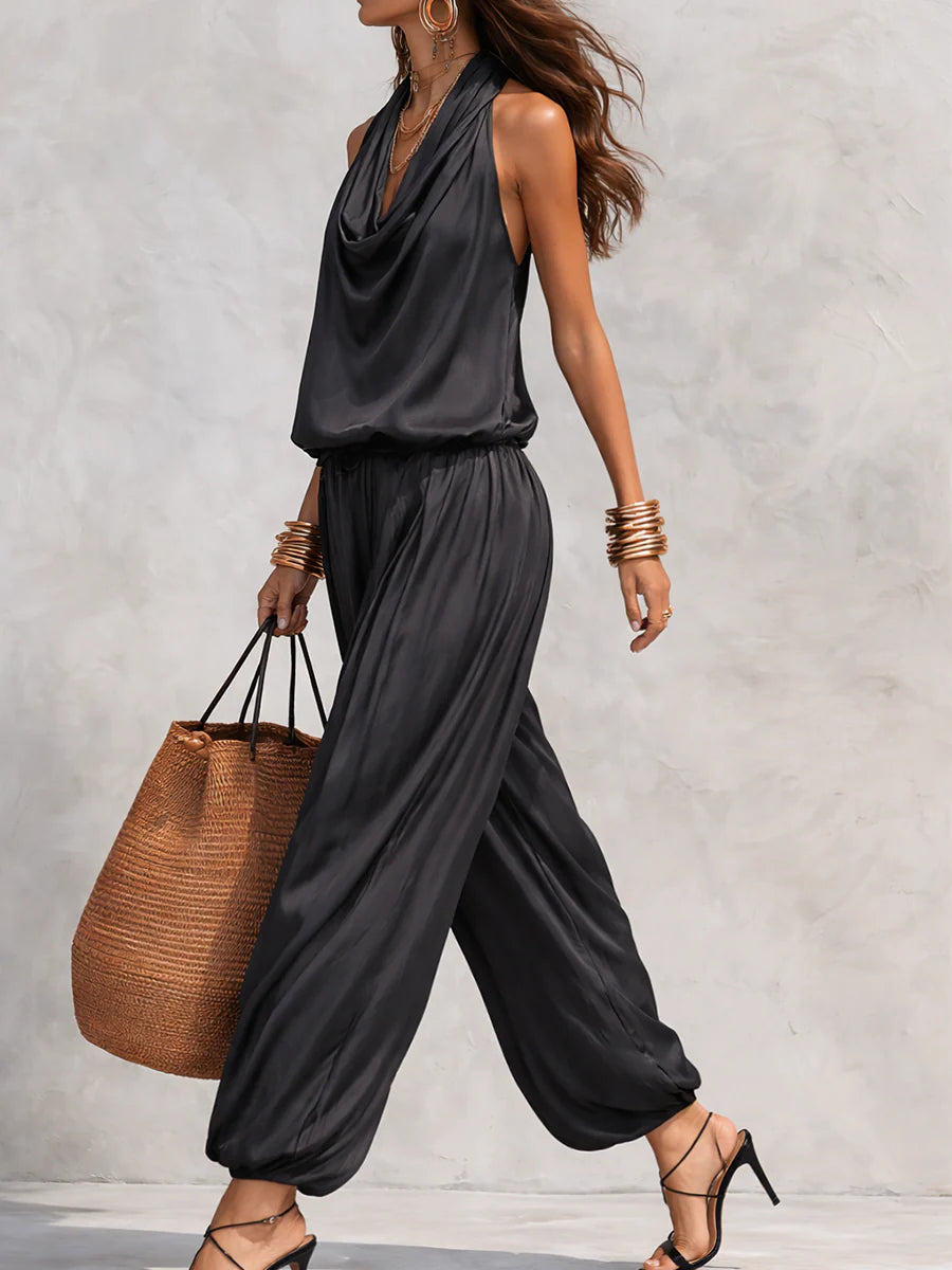 Stylish women's two-piece set: cowl neck halter top & wide leg pants. Versatile for resort or party.