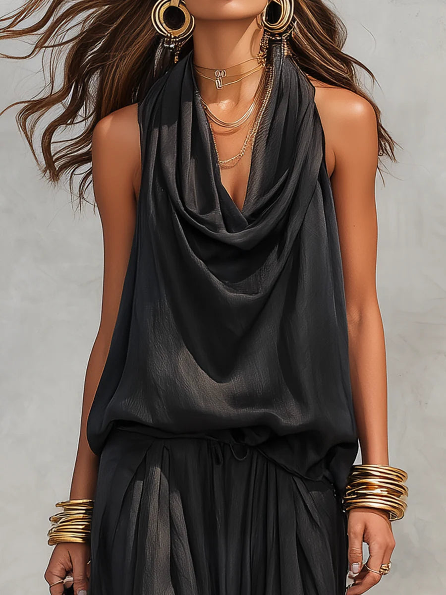 Chic women's cowl neck halter top with wide leg pants. A comfortable and elegant resort wear set.
