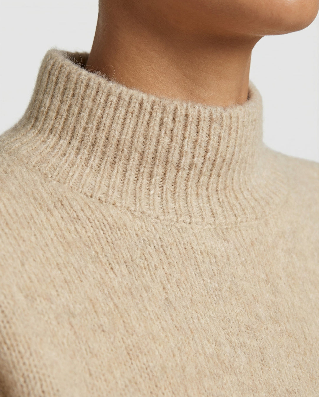 Versatile women's textured turtleneck sweater, a chic & cozy addition to your fall & winter wardrobe.