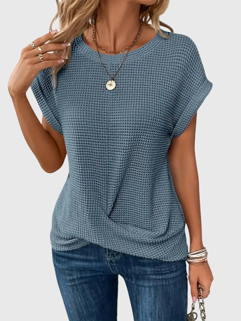 Versatile women's crew neck blouse, offering timeless elegance for summer casual or office wear.