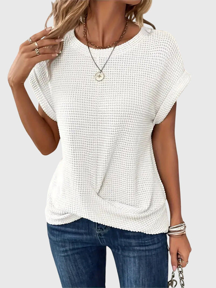 Sophisticated women's elegant top featuring a comfortable crew neck for a polished, everyday style.