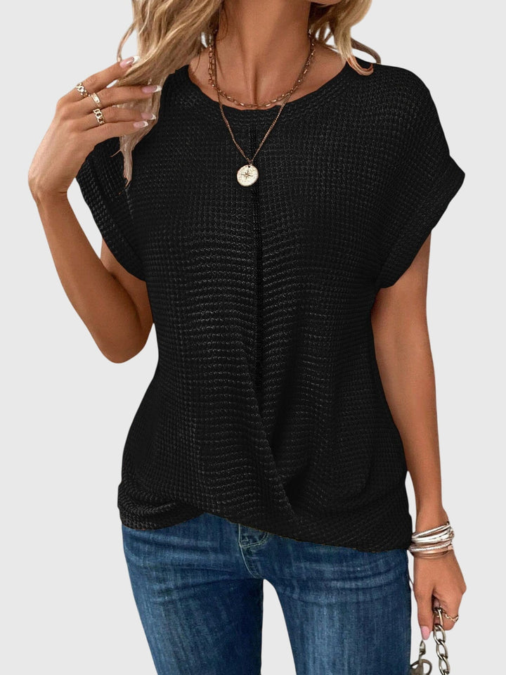 Lightweight women's elegant blouse with a flattering crew neck, essential for chic summer & spring fashion.
