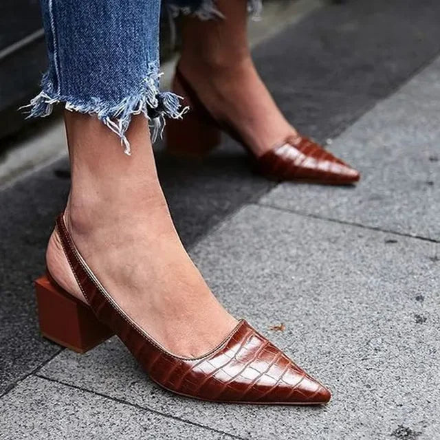Elegant women's croco print slingback heels. Chic design, comfortable fit for dress or work wear.